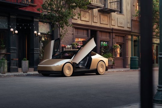 Elon Musk și-a prezentat noile mașini futuriste fără șofer. Ce sunt și cum arată „Robovan” și „Cyber Taxi”